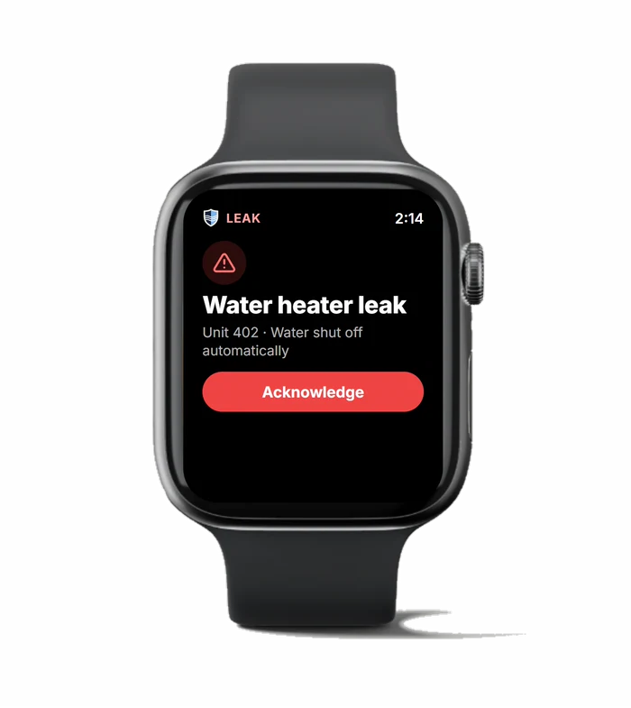 Smartwatch showing a BluSentry alert: water heater leak in Unit 402, water shut off automatically, with an Acknowledge button